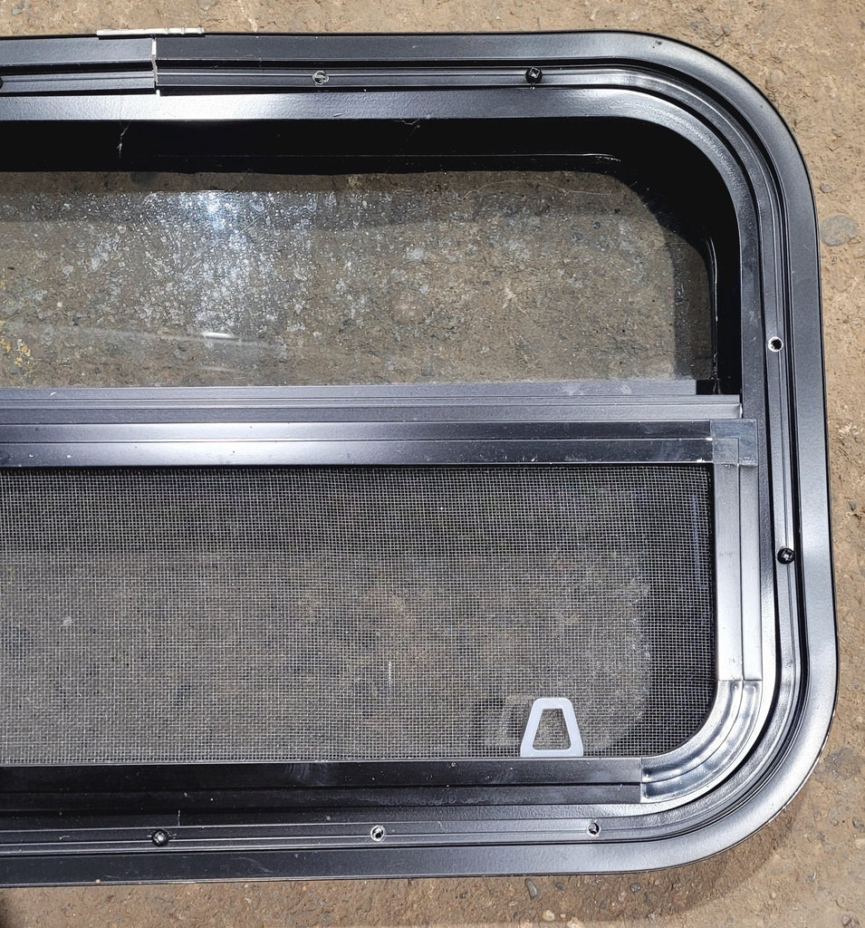 Used Black Radius Opening Window : 24 1/4" W x 14 1/4" H x 1 7/8"