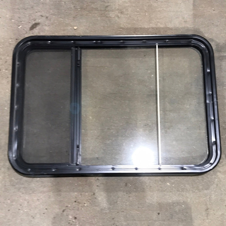 USED Black Radius Opening Window : 23" W x 33 3/4" H x 2" D - Young Farts RV Parts