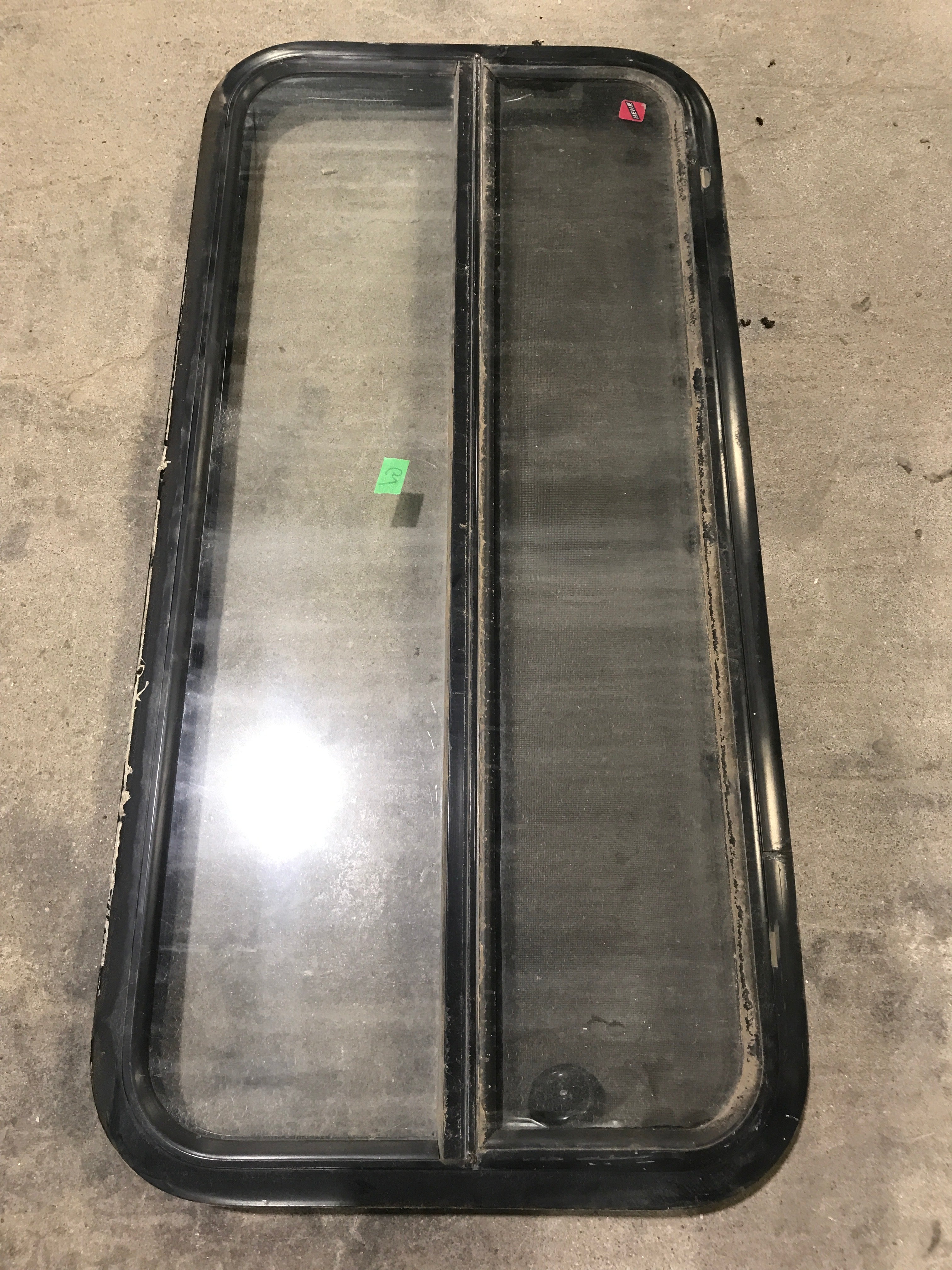 Used Black Radius Opening Window : 41 1/2" W x 19 1/2" H x 2" D - Young Farts RV Parts