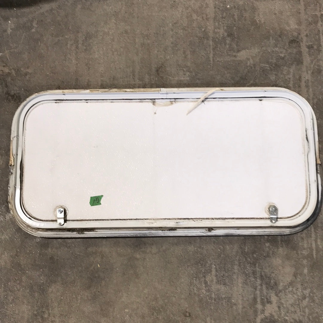 Used White Corner radius cargo door  29 3/4" W x 13 3/4" H x 1"D