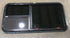 Used Black Radius Emergency Opening Window : 41 1/2" W x 21 1/2" H x 1 7/8"