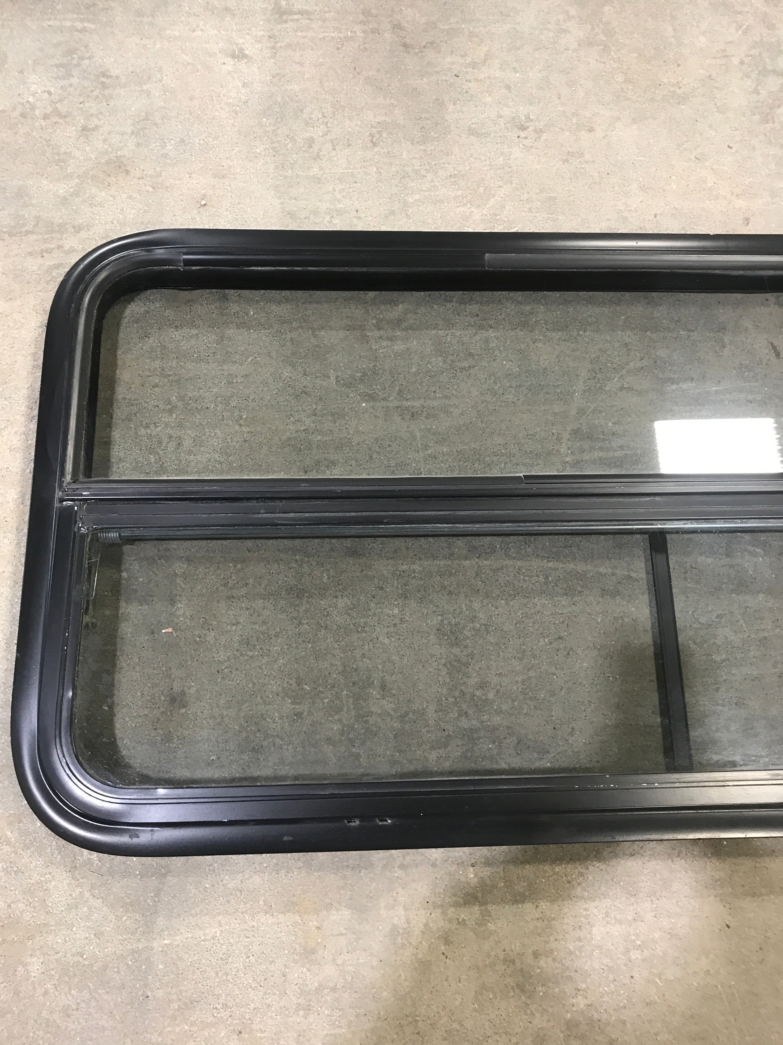 Used Black Radius Opening Window : 45 1/2" W X 21 1/2" H X 2" D