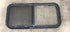 Used Black Radius Opening Window : 35 1/2" W X 17 1/2" H X 2" D - Young Farts RV Parts