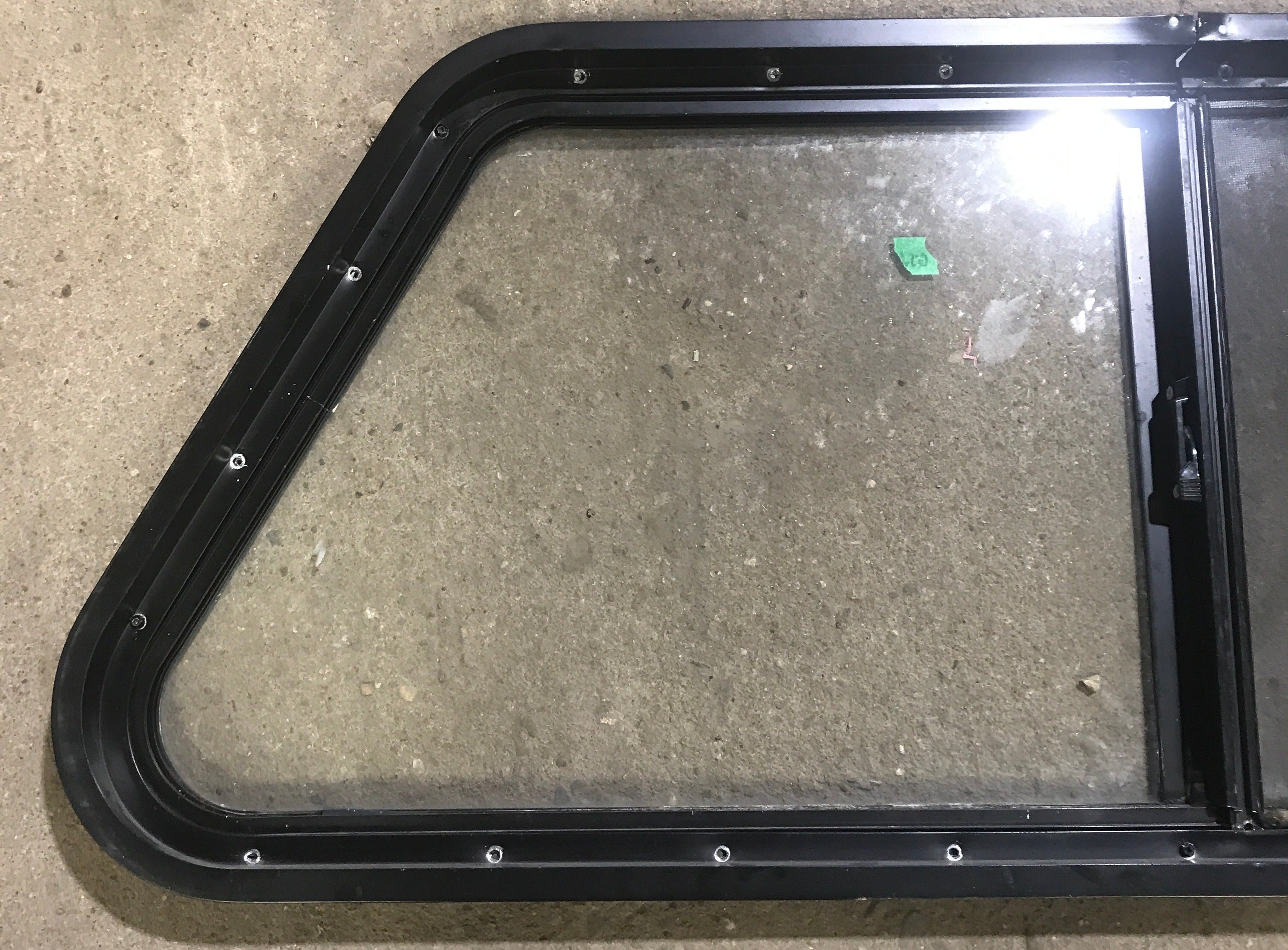 Used Slanted Black Radius Opening Window : 41 3/4" W x 17 1/2" H x 1 7/8" D - Young Farts RV Parts