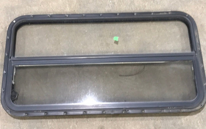 USED Black Radius Opening Window : 42 1/2" W x 22 1/2" H x 2" D - Young Farts RV Parts
