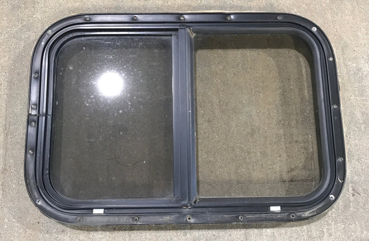 Used Black Radius Opening Window : 24 1/2" W x 19 1/4" H x 1 1/4"