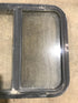 Used Black Radius Opening Window : 24 1/2" W x 21 1/2" H x 1 7/8" D