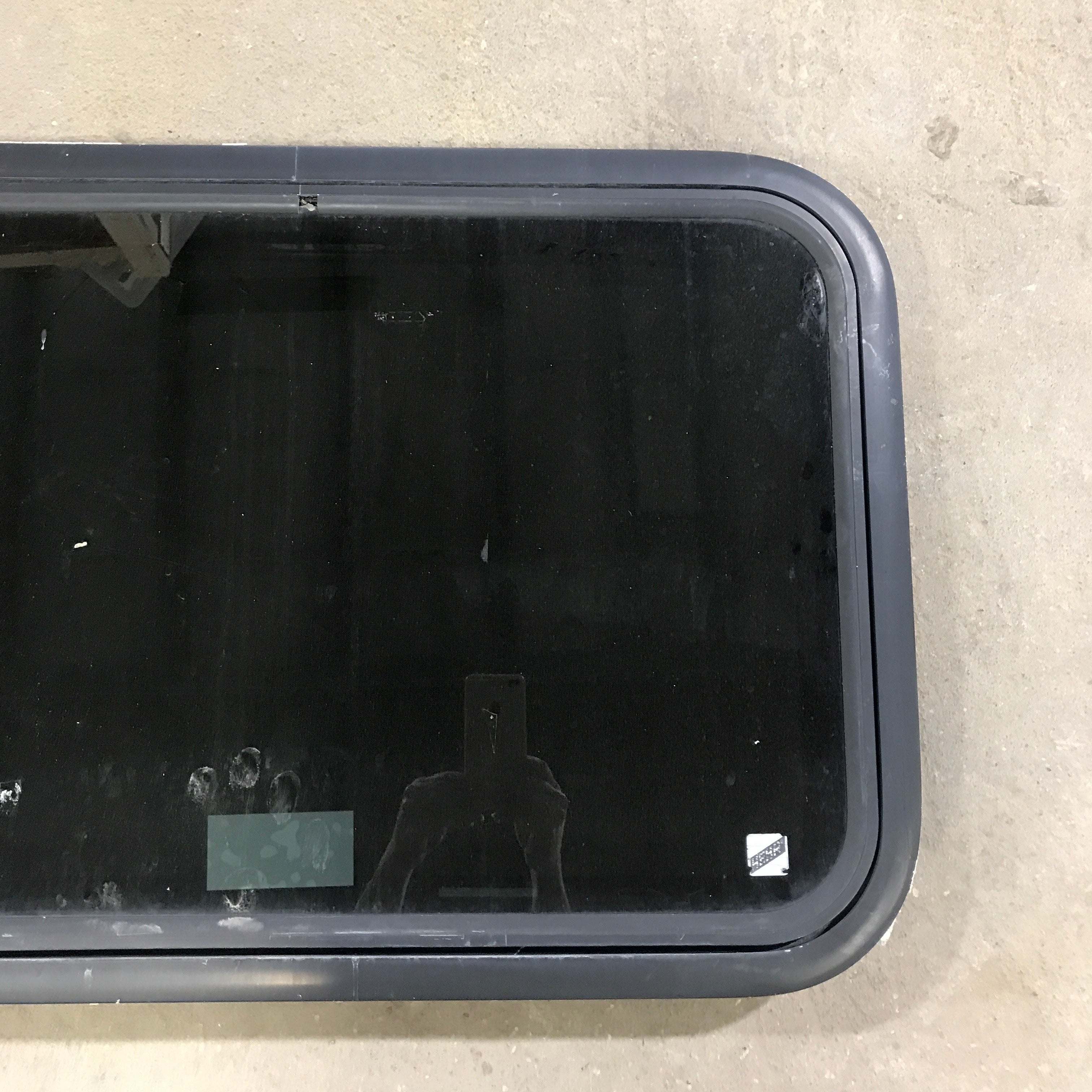 Used Black Radius Emergency Opening Window : 29.5" X 19.5" X 1.5" - Young Farts RV Parts