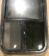 Used Black Radius Opening Window : 17 1/2" W x 39 1/2" H x 1 7/8" D
