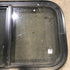 Used Black Radius Opening Window : 23.5" X 14.5" X 1.25" - Young Farts RV Parts