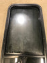 Used Black Radius Opening Window : 17 1/2" W x 39 1/2" H x 1 7/8" D