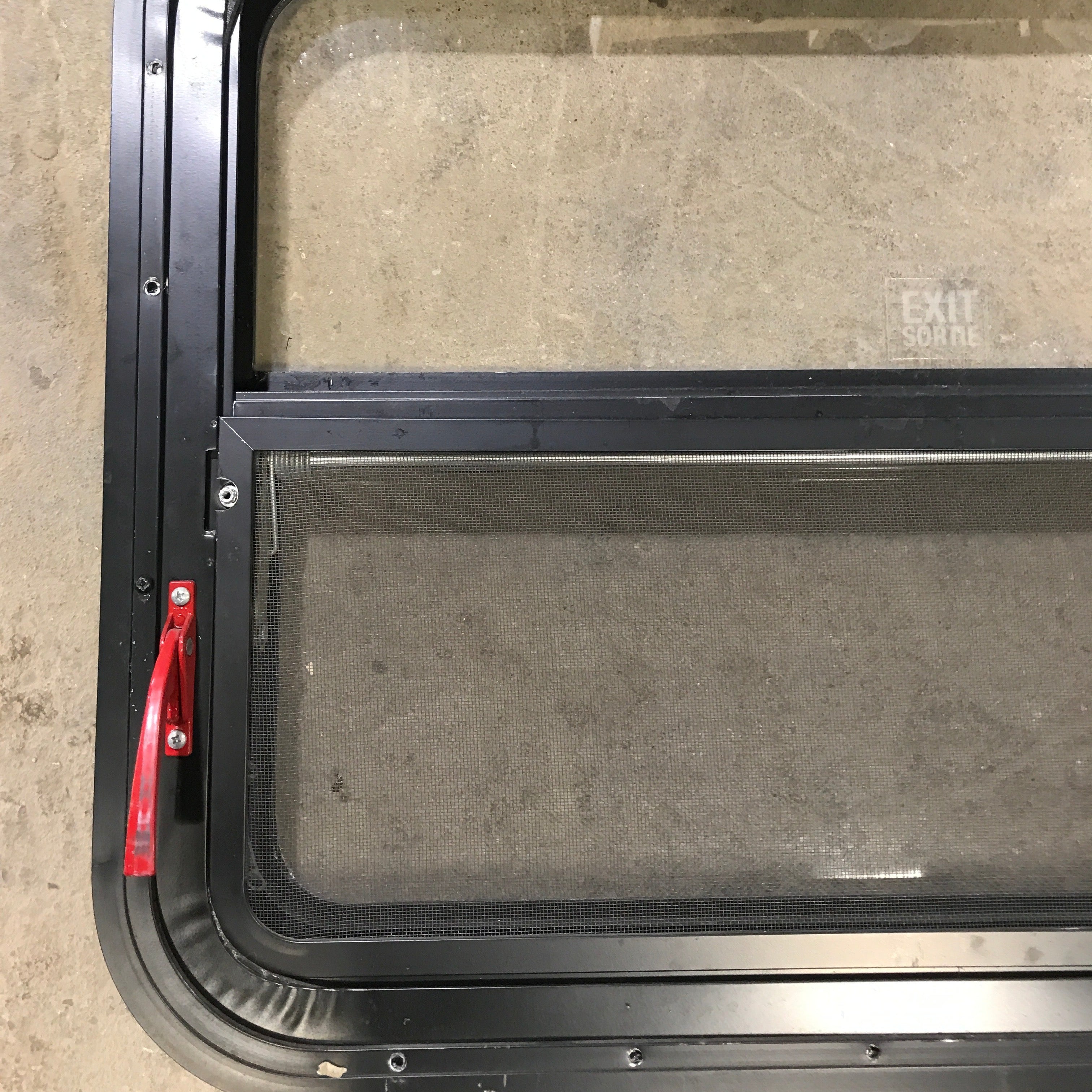 Used Black Radius Emergency Opening Window : 29.5" X 21.5" X 2" - Young Farts RV Parts