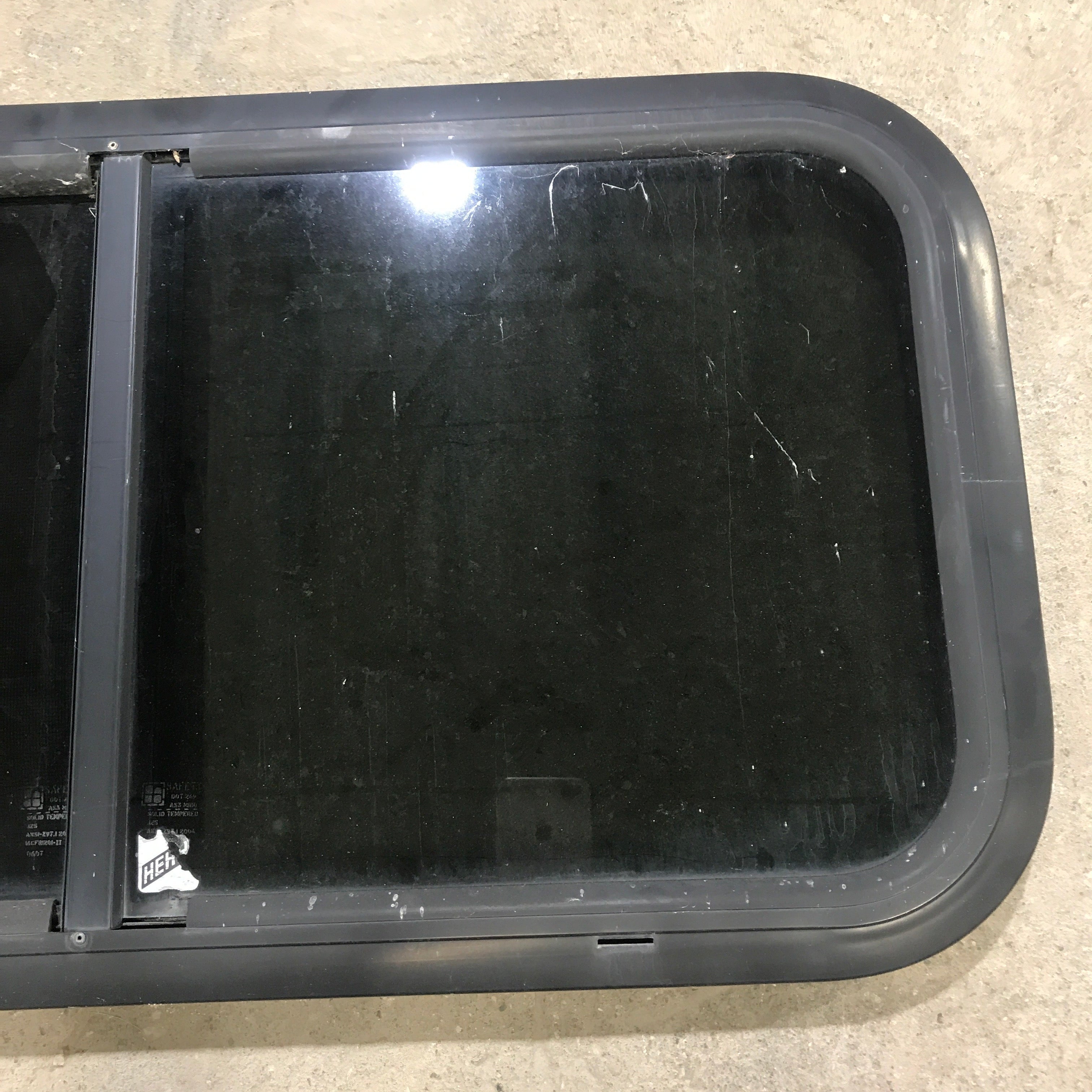 Used Black Radius Opening Window : 29.5" X 14.5" X 1.5" - Young Farts RV Parts