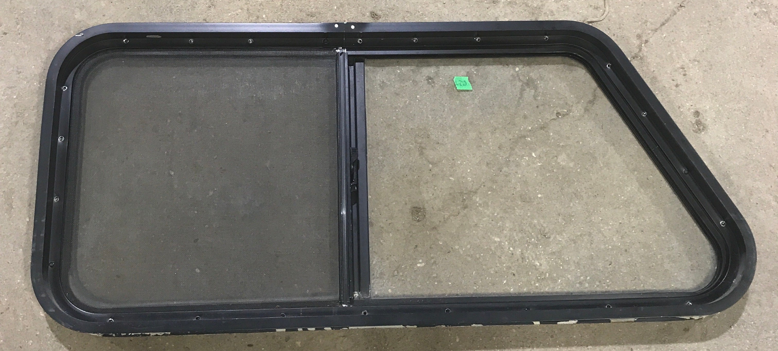 Used Slanted Black Radius Opening Window : 41 3/4" W x 17 1/2" H x 1 7/8" D - Young Farts RV Parts