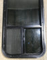 Used Black Radius Opening Window : 17 1/2" W x 39 1/2" H x 1 7/8" D