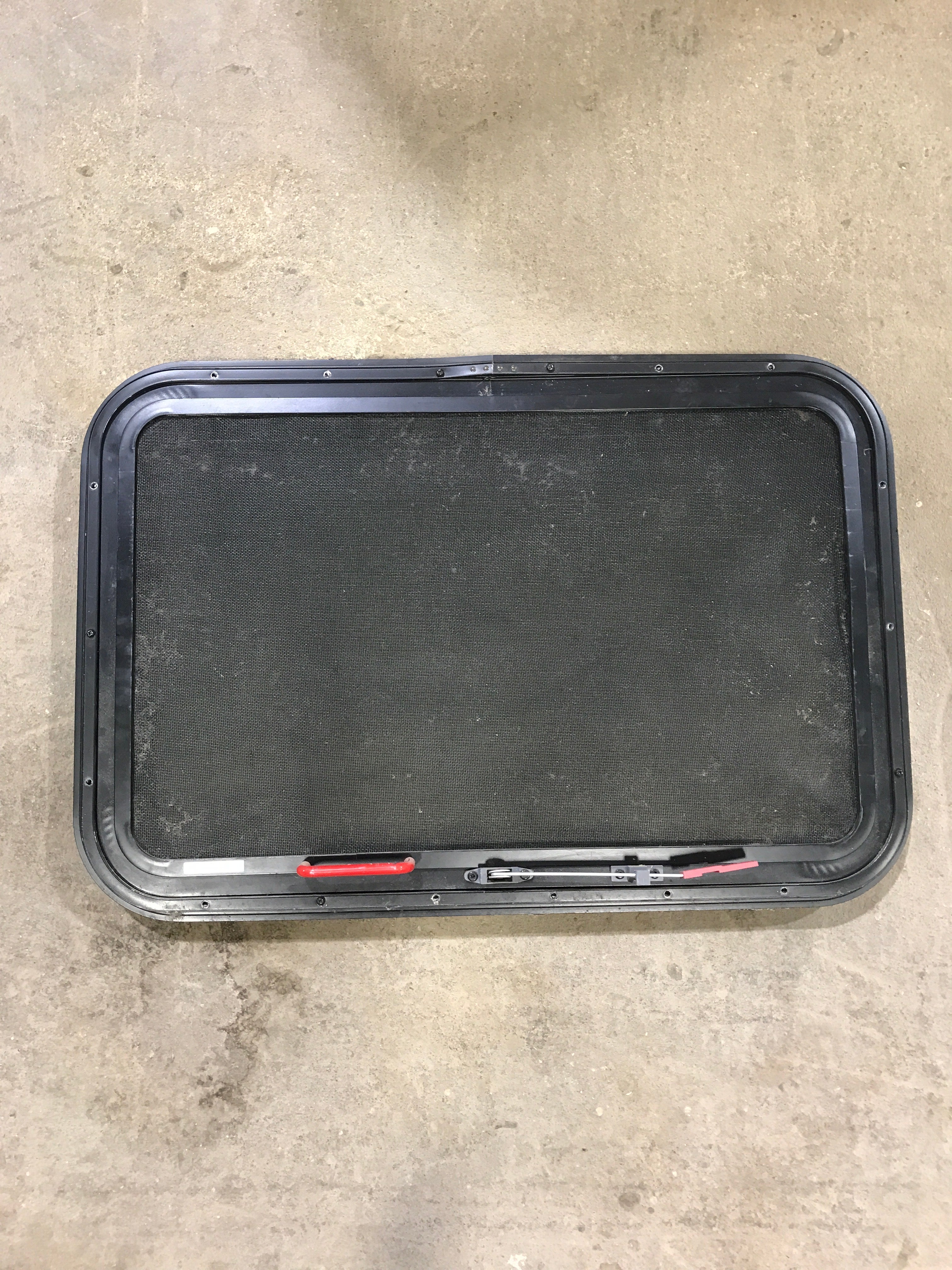 Used Black Radius Emergency Opening Window : 29.5" X 19.5" X 1.5" - Young Farts RV Parts