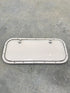 Used Radius Cargo / compartment Door 23 3/4" W x 9 3/4" H