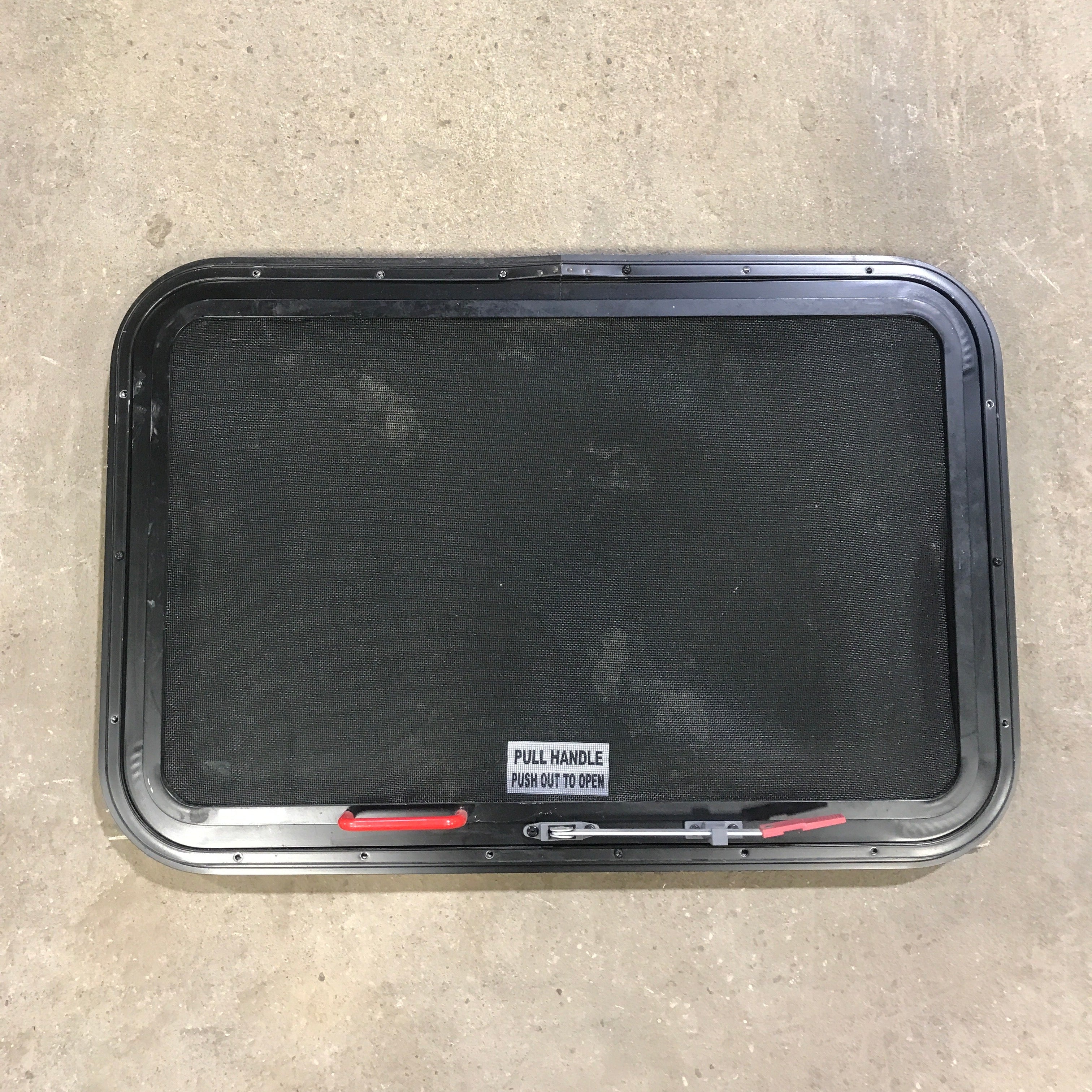 Used Black Radius Emergency Opening Window : 29.5" X 19.5" X 1.5" - Young Farts RV Parts