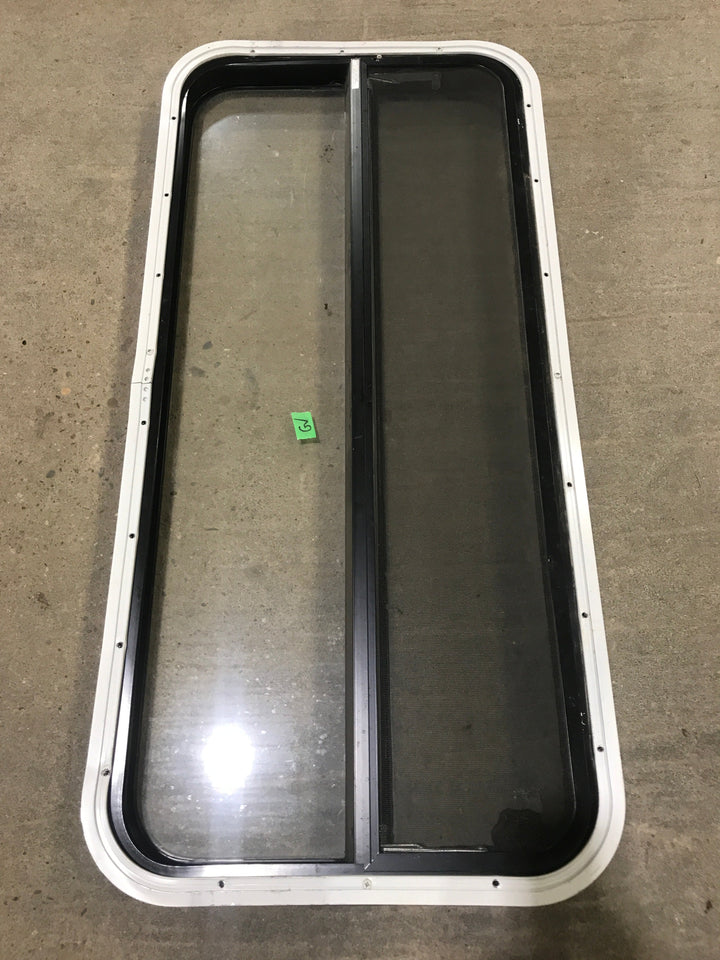 Used Black Radius Opening Window : 41 1/2" W x 19 1/2" H x 2" D - Young Farts RV Parts