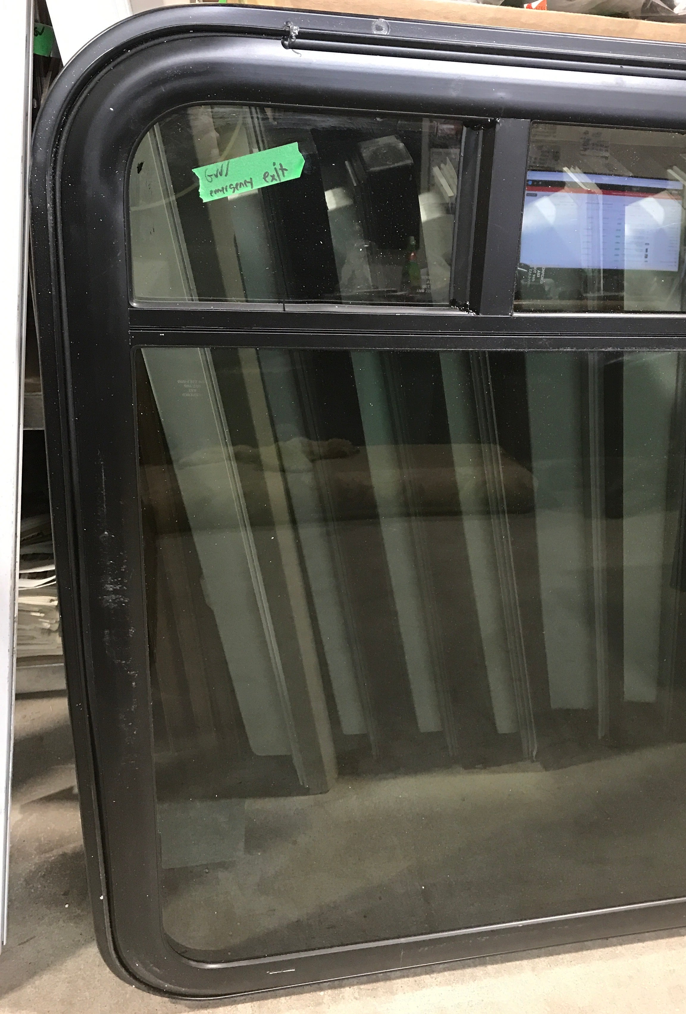 Used Black Radius Emergency Opening Window : 35 3/4" W x 36" H x 3/4"