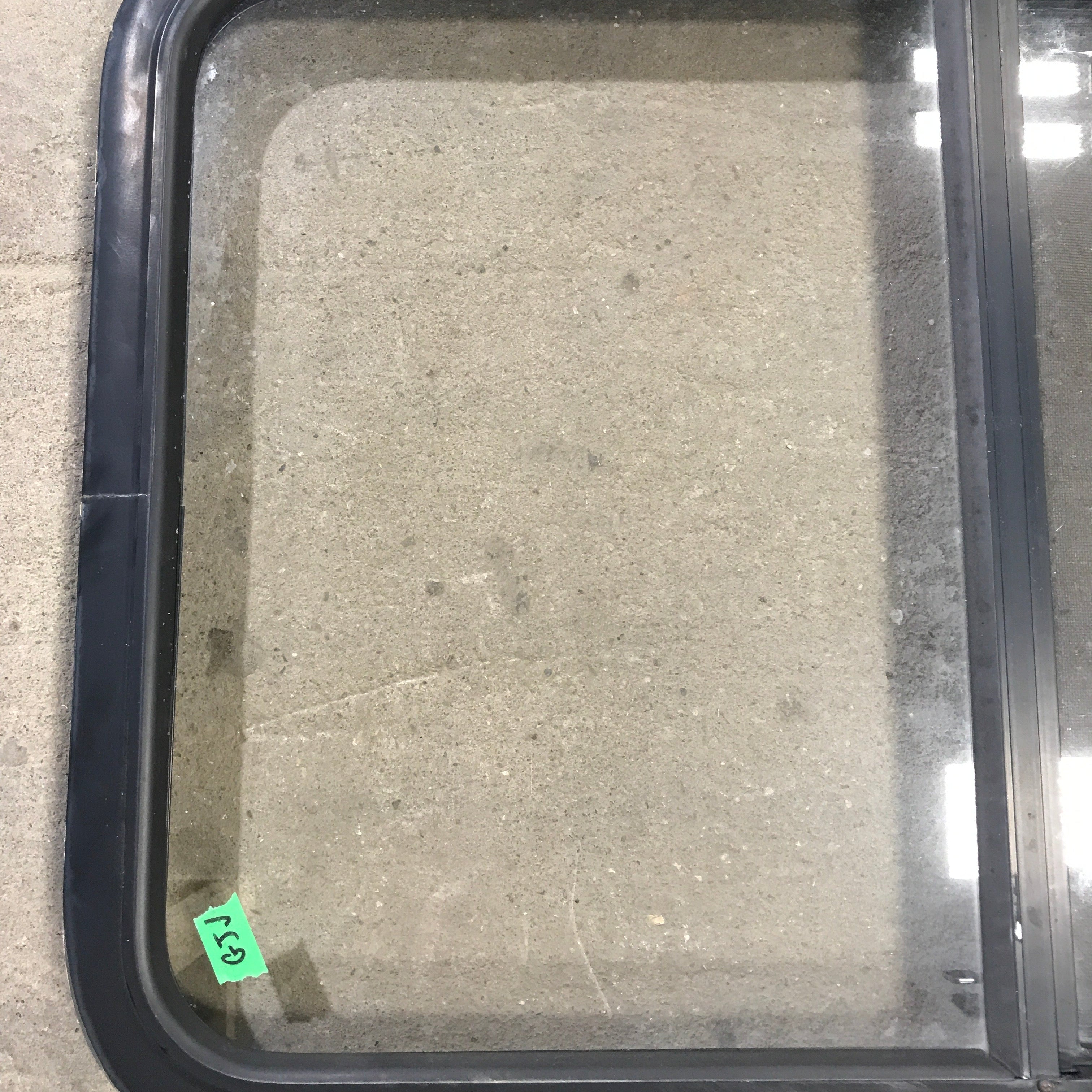 Used Black Radius Opening Window : 23" X 34.5" X 1.875" - Young Farts RV Parts