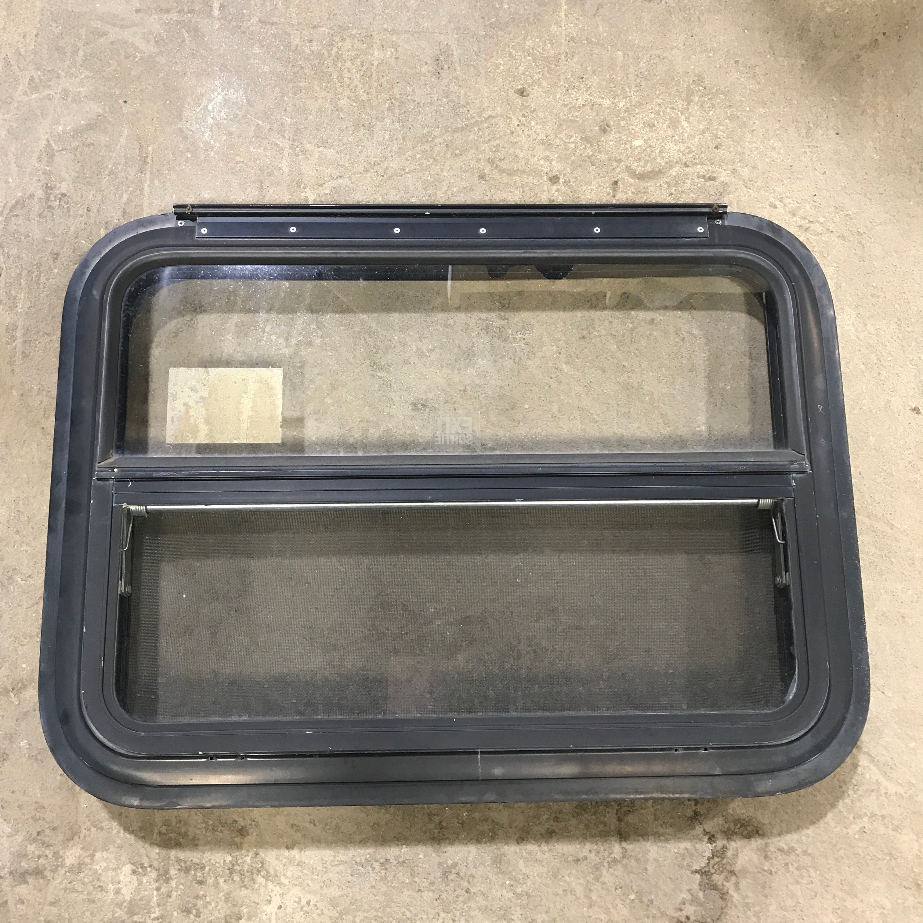 Used Black Radius Emergency Opening Window : 29.5" X 21.5" X 2" - Young Farts RV Parts