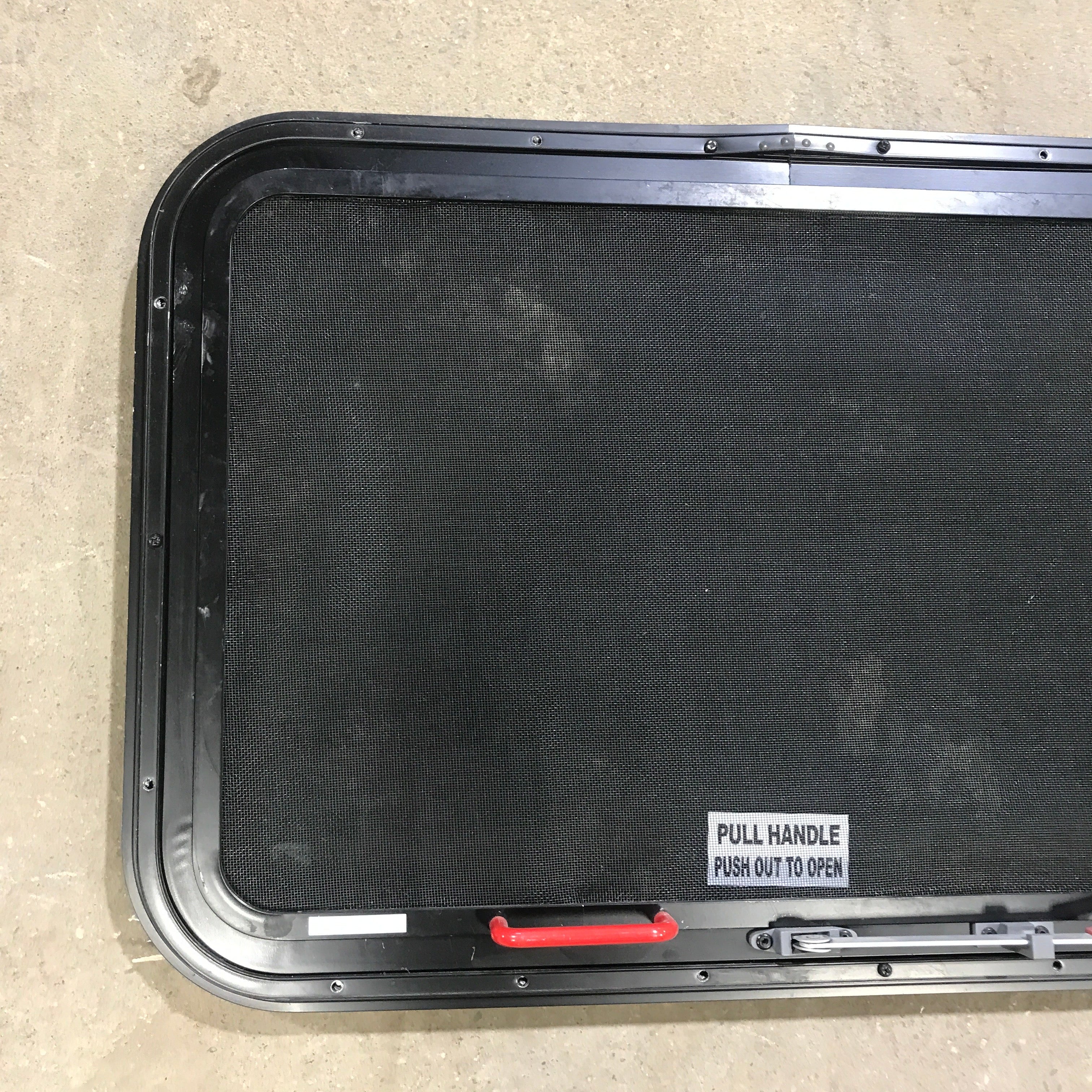 Used Black Radius Emergency Opening Window : 29.5" X 19.5" X 1.5" - Young Farts RV Parts