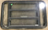 Used Black Radius Emergency Opening Window : 35" W x 21 1/4" H x 1 7/8" D