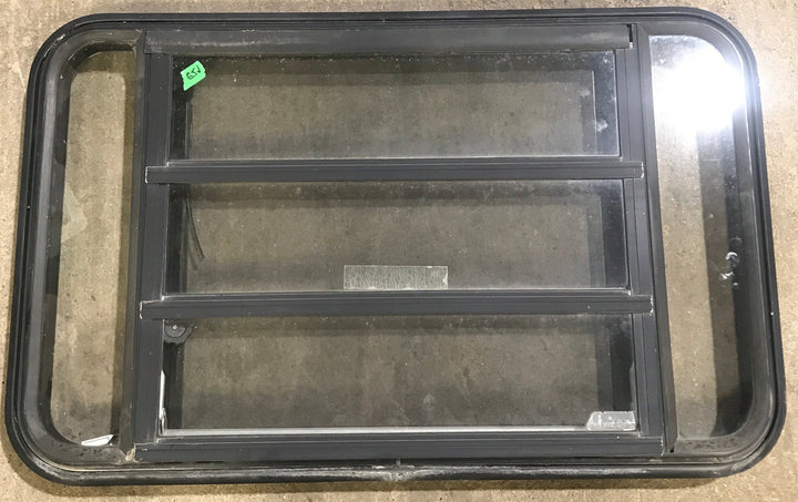 Used Black Radius Emergency Opening Window : 35" W x 21 1/4" H x 1 7/8" D