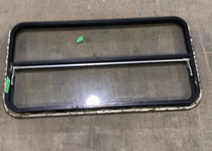 USED Black Radius Opening Window : 42 1/2" W x 22 1/2" H x 2" D - Young Farts RV Parts