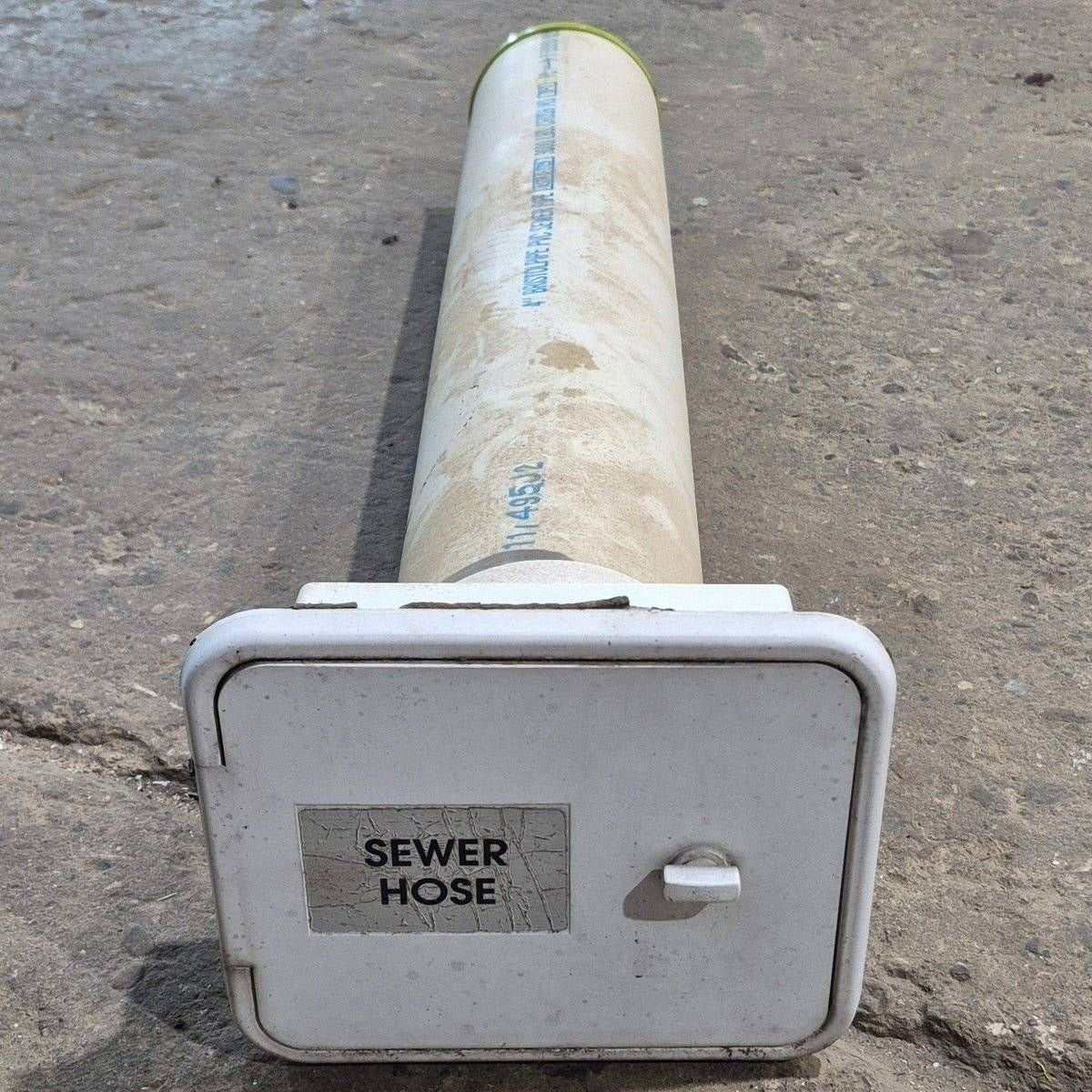 Used RV Sewer Hose Setup - 7 5/8" x 6 5/8" x 26" - used access hatch