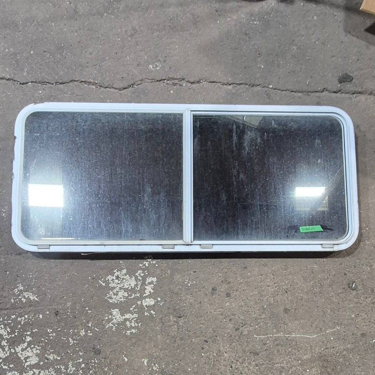 Used White Radius Opening Window - 57 1/4" X 24 1/2" X 2" - Emergency Window