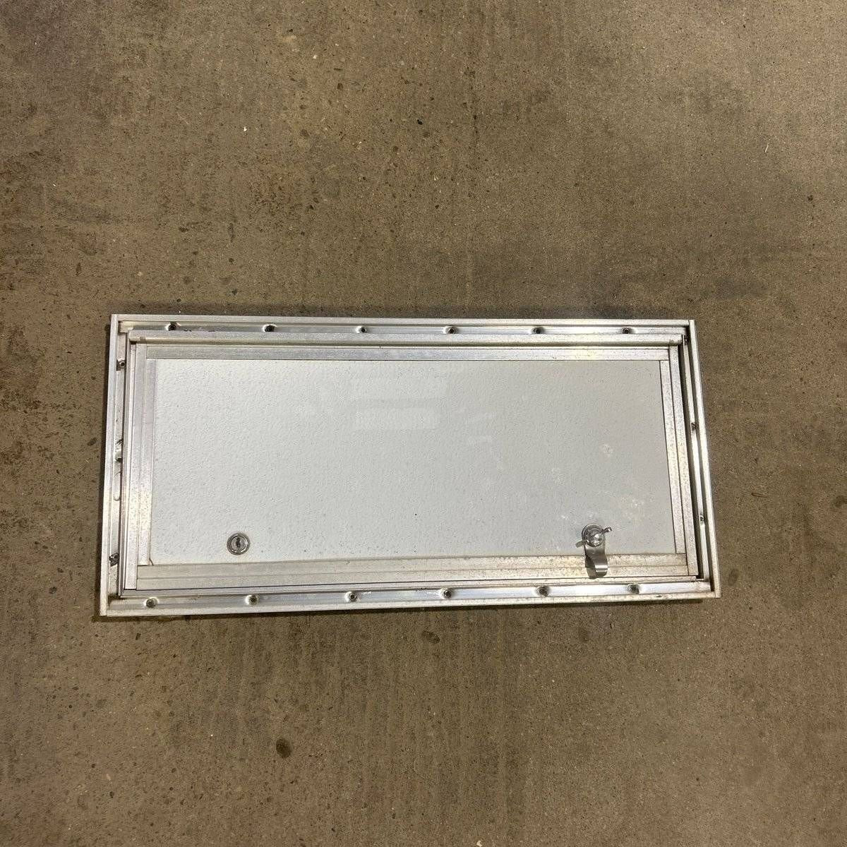 Used Square Cornered Cargo Door - 23.75 X 10.50 X .75 - Silver Trim