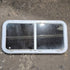 Used White Radius Emergency Opening Window - 42 1/2" X 21 1/4" X 2" - Black Window