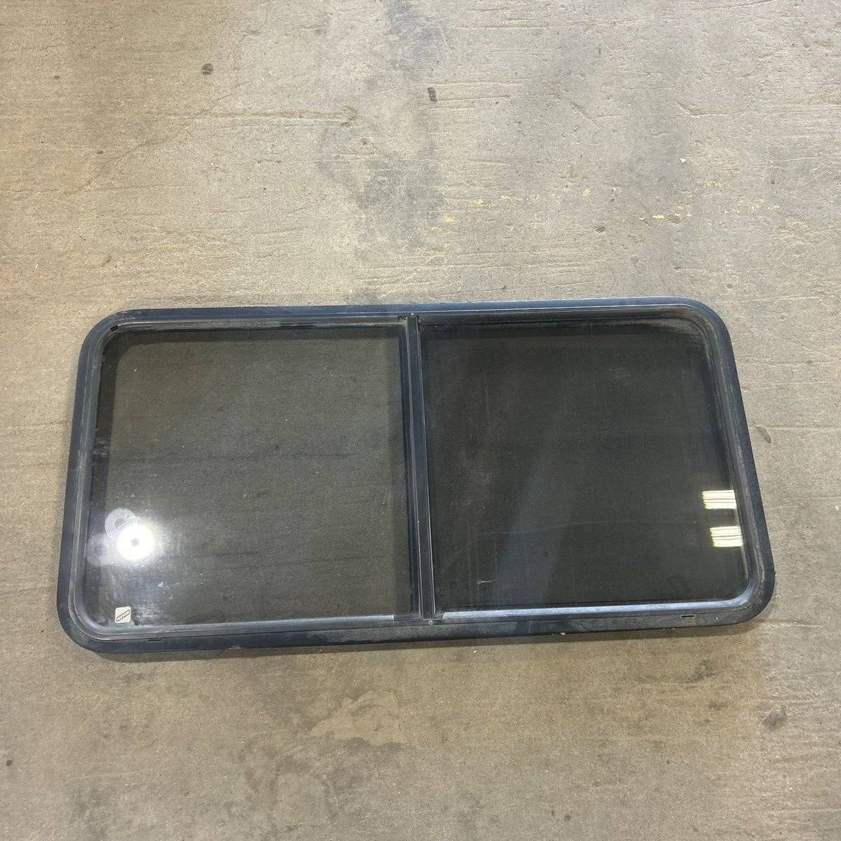 Used Black Radius Opening Window - 47.75 X 24.75 X 1.875 - Black Window