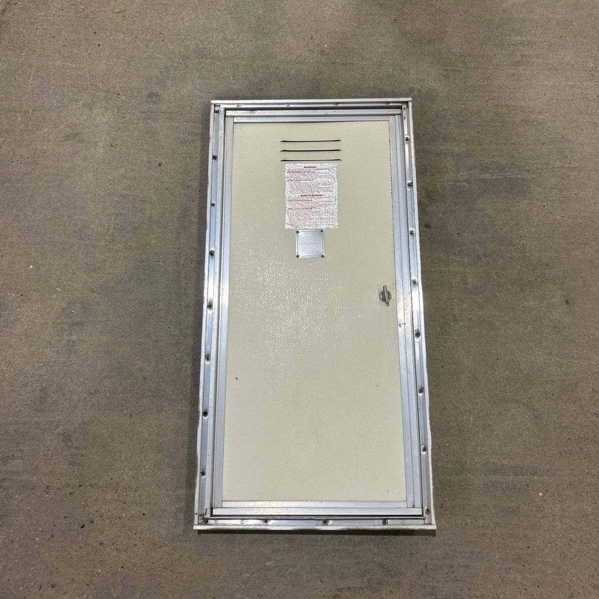 Used Square Corner Propane door - 30.75 X 14.0 X .75 - Silver Trim