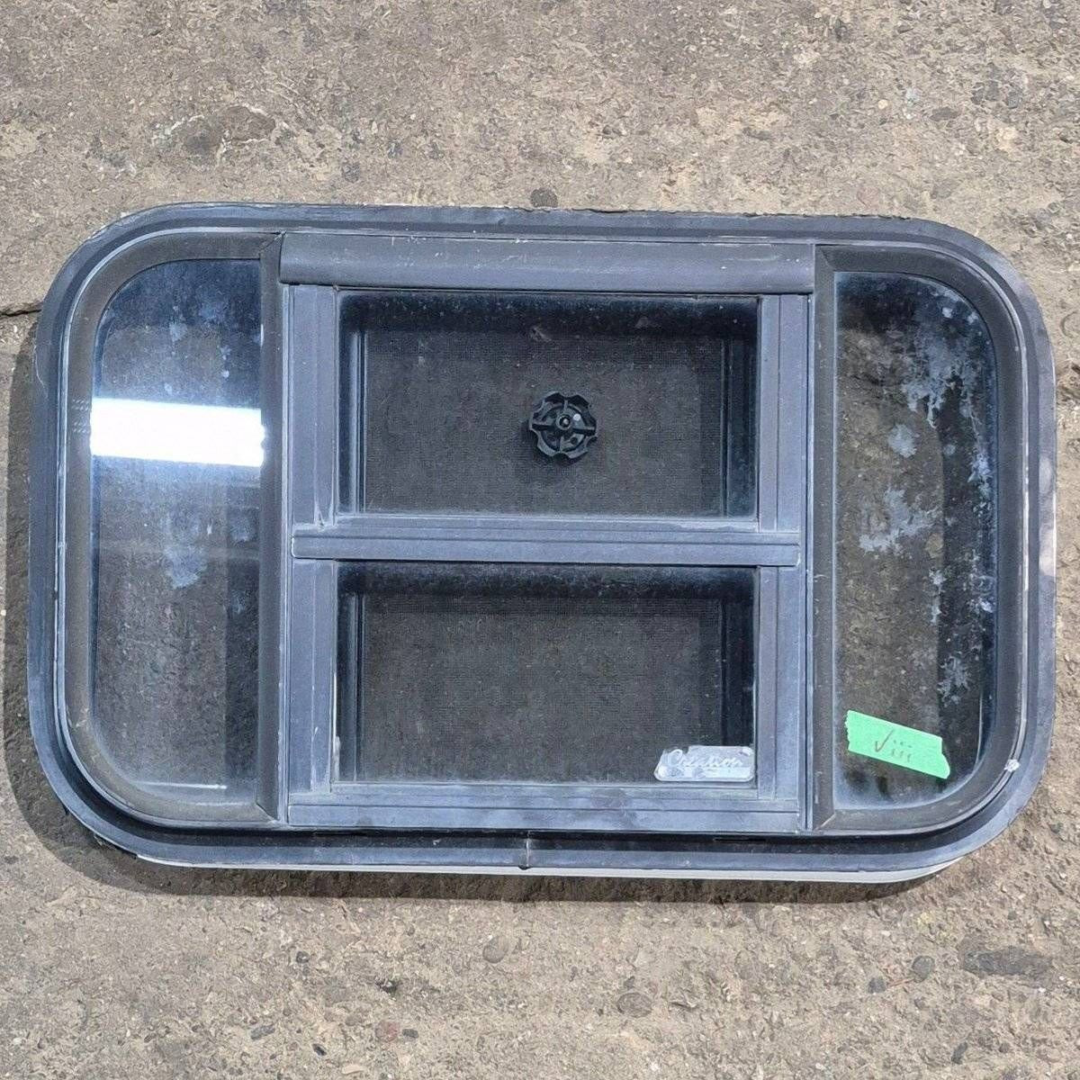 Used Black Radius Opening Window - 23 1/8" X 14 1/2" X 1 7/8" - Black Window