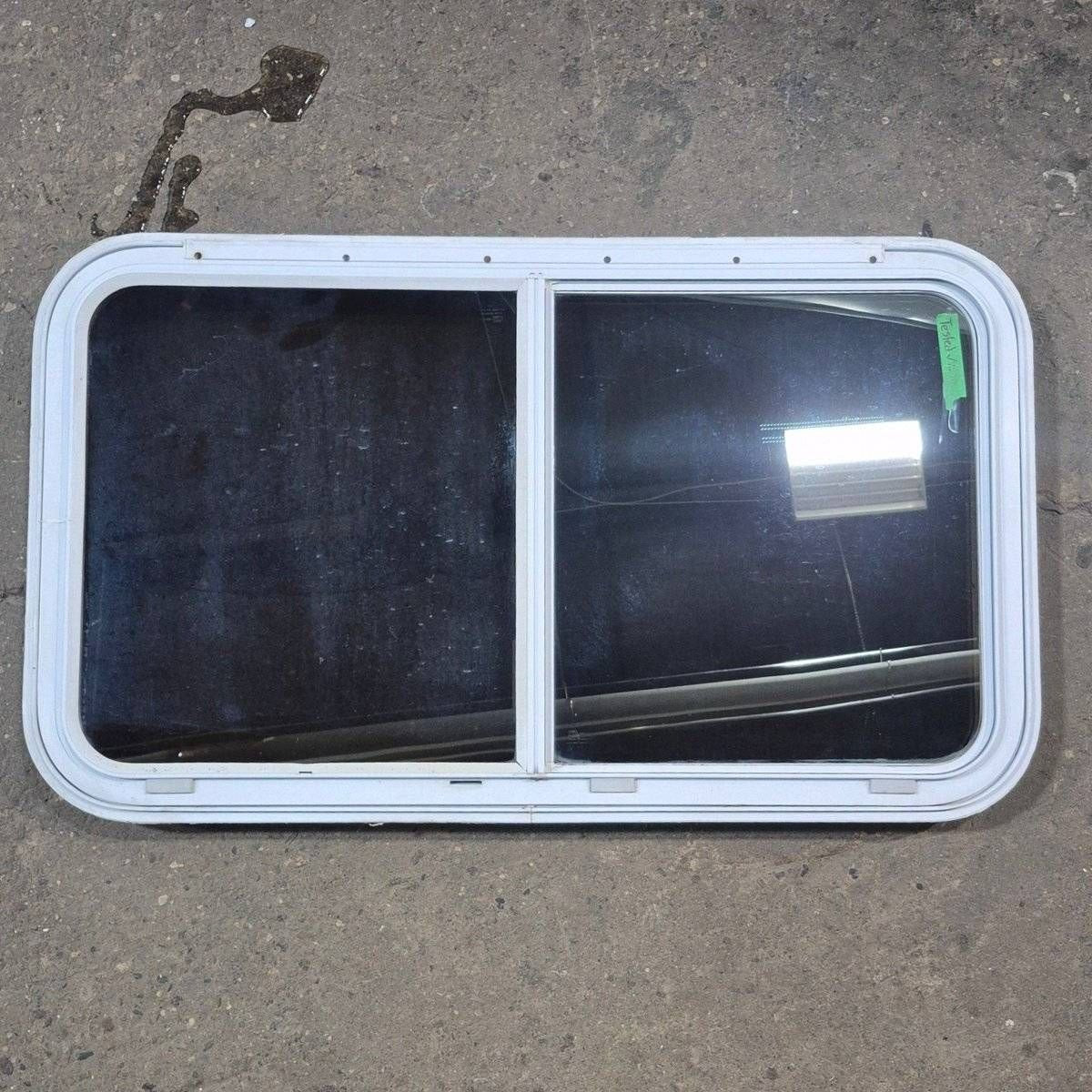 Used White Radius Emergency Opening Window - 42 5/8" X 24 3/8" X 1 7/8" - Black Window