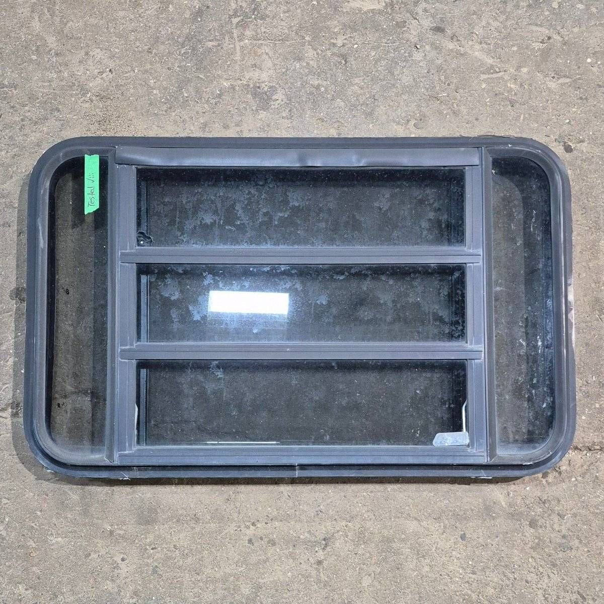 Used Black Radius Opening Window - 35 1/8