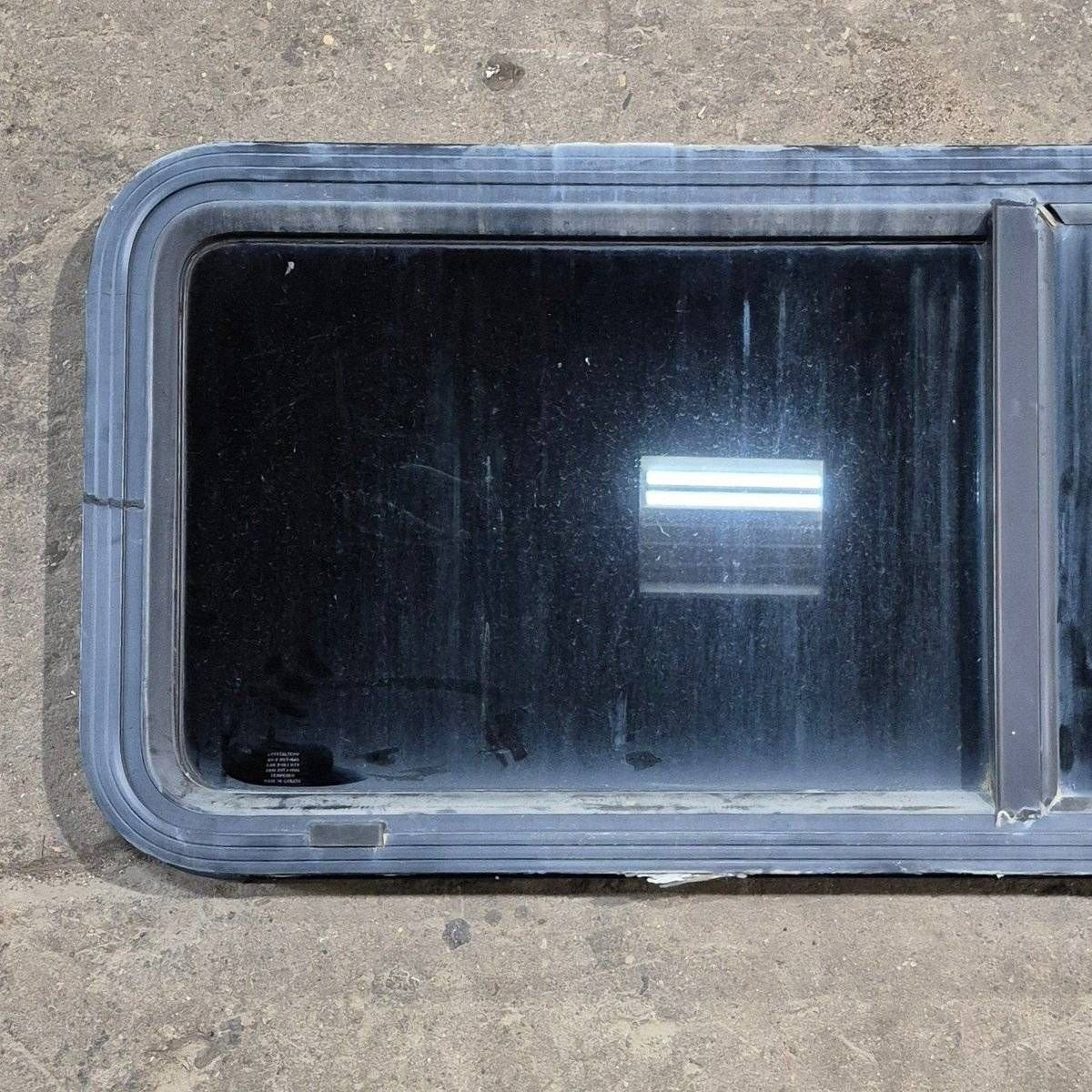 Used Black Radius Opening Window - 47 1/2