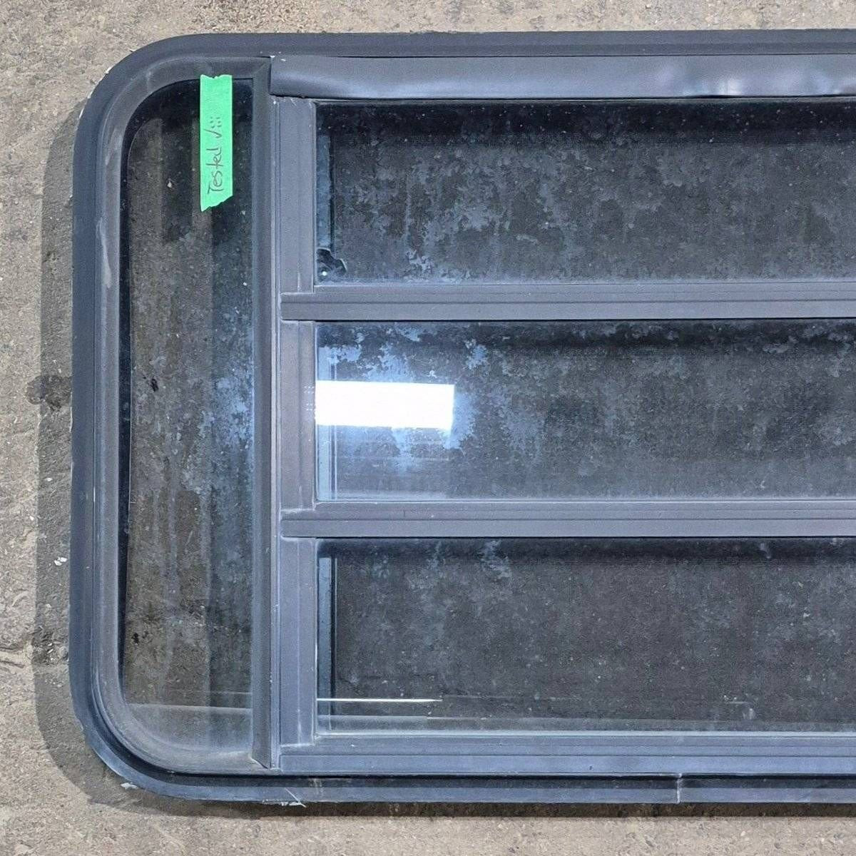 Used Black Radius Opening Window - 35 1/8