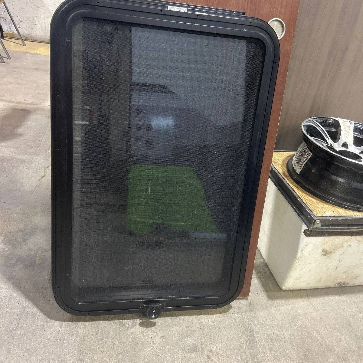Used Black Radius Frameless Emergency Opening Window : 35 1/2