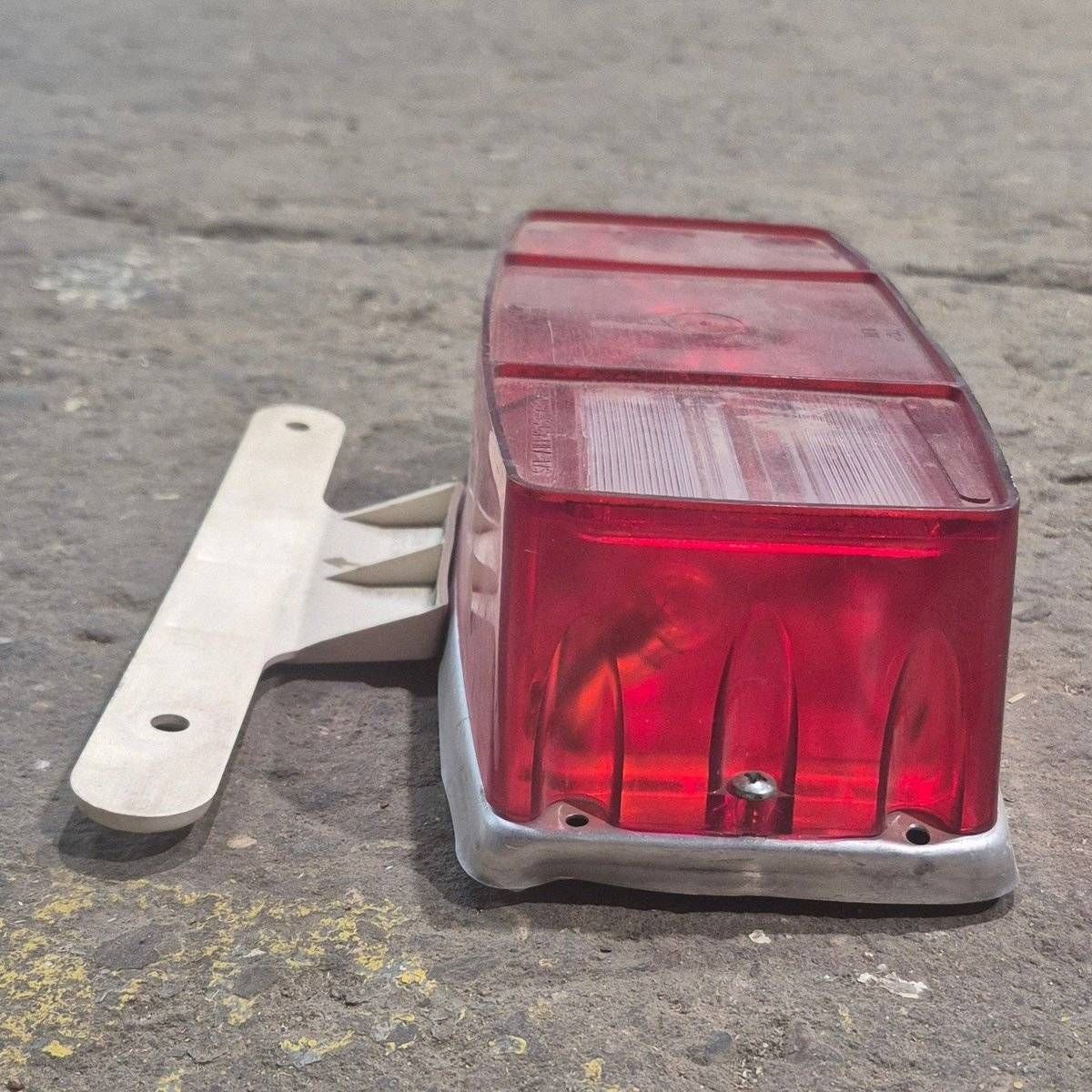 Used Miro-Flex RV Tail Light Assembly, With License Plate Bracket,  10 1/8