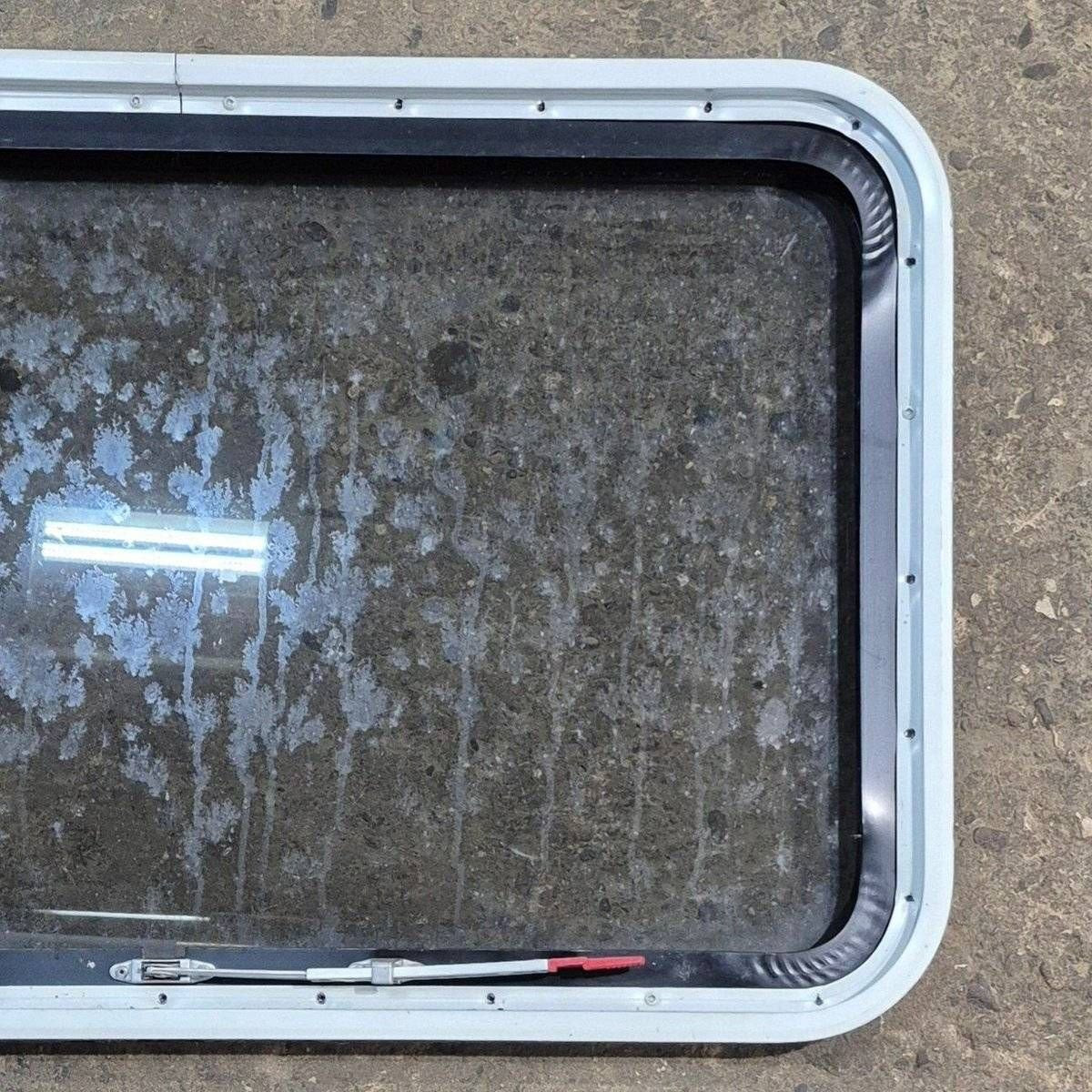 Used Black Radius Emergency Opening Window - 35 1/8