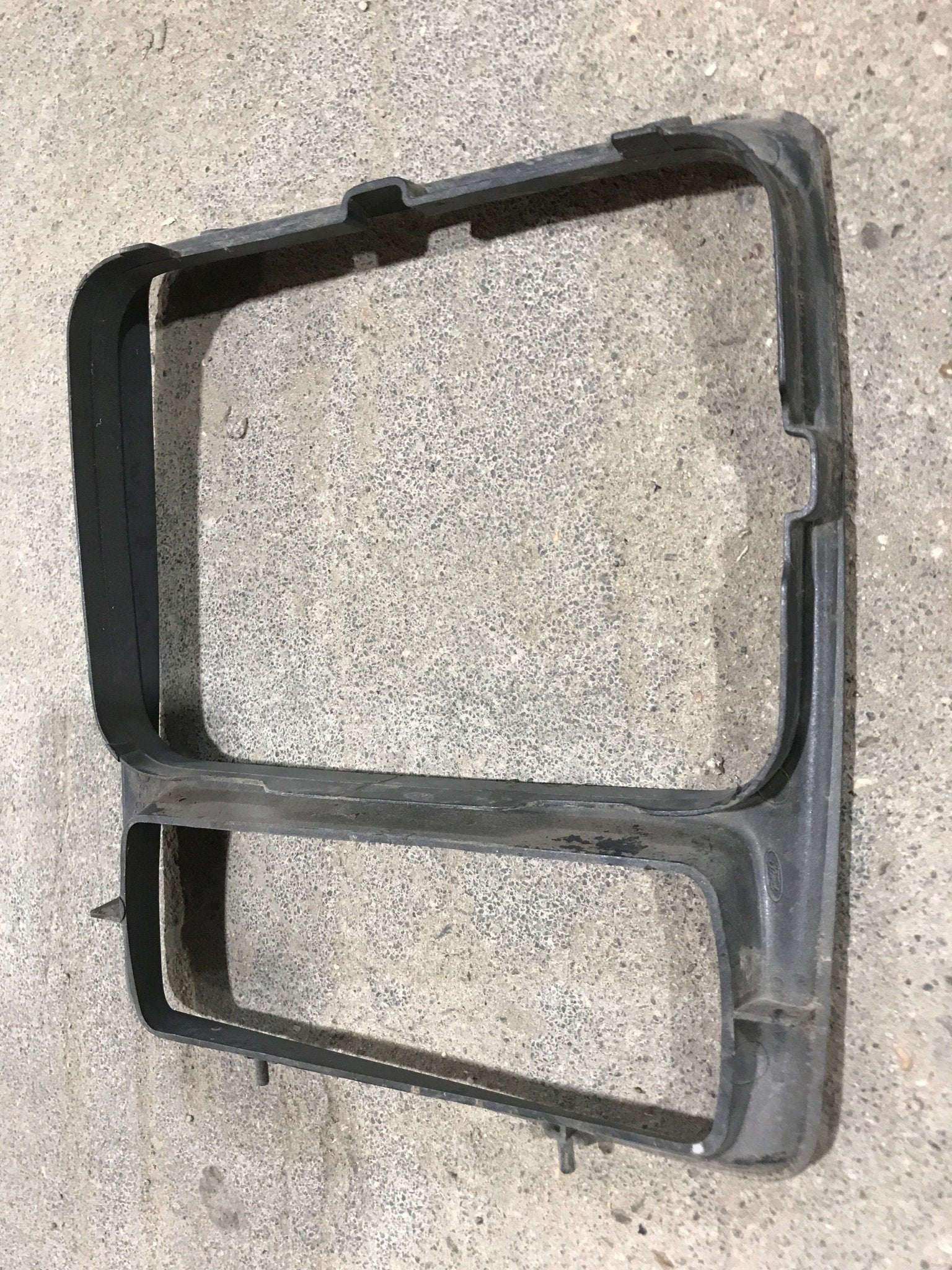 Used 1989 Ford Class C Headlight Housing - Drivers side - Young Farts RV Parts