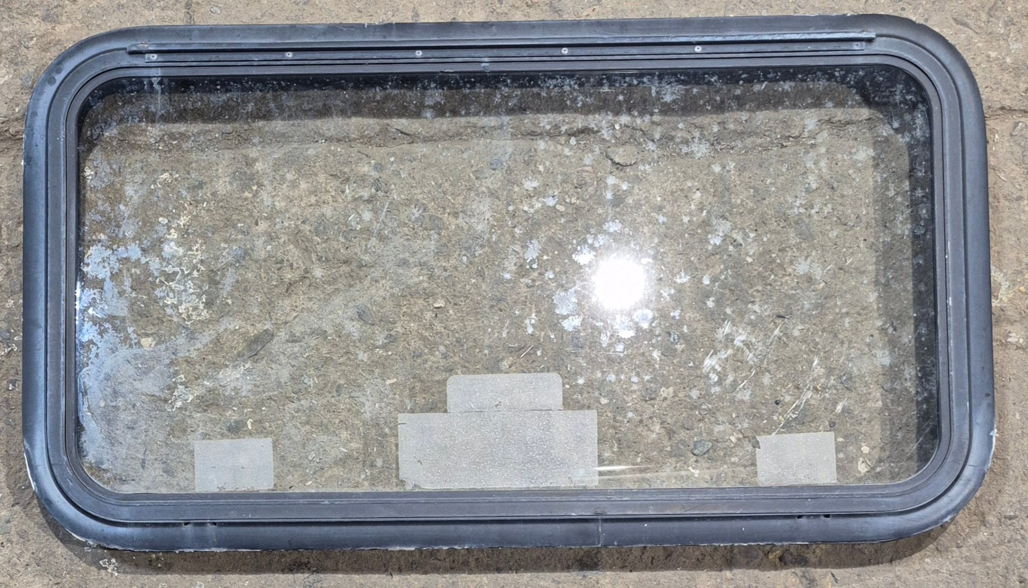 Used Black Emergency Radius Opening Window : 35 1/2" W x 18 3/4" H x 1 7/8" - Young Farts RV Parts