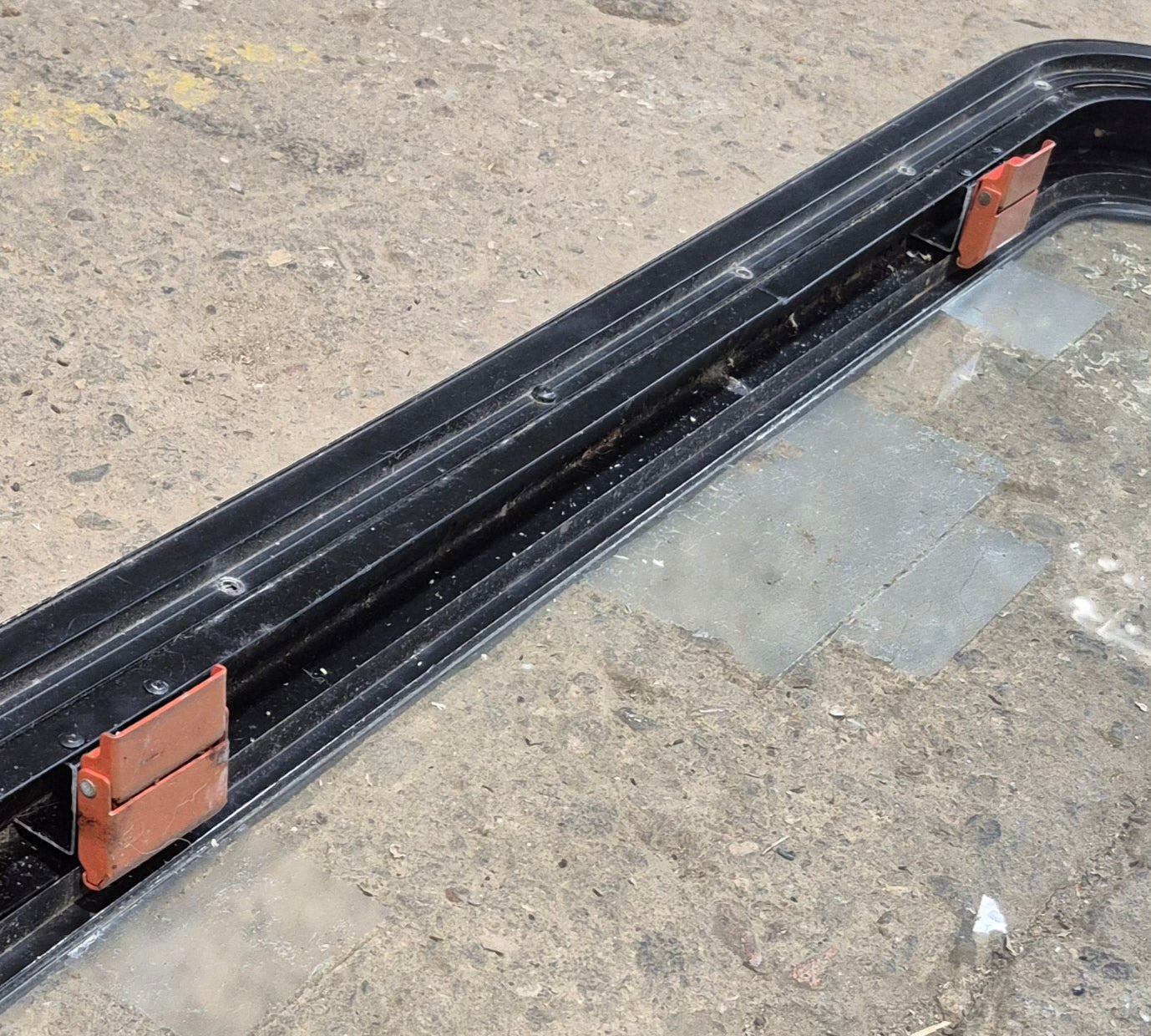 Used Black Emergency Radius Opening Window : 35 1/2" W x 18 3/4" H x 1 7/8" - Young Farts RV Parts