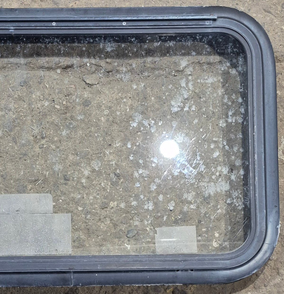 Used Black Emergency Radius Opening Window : 35 1/2" W x 18 3/4" H x 1 7/8" - Young Farts RV Parts