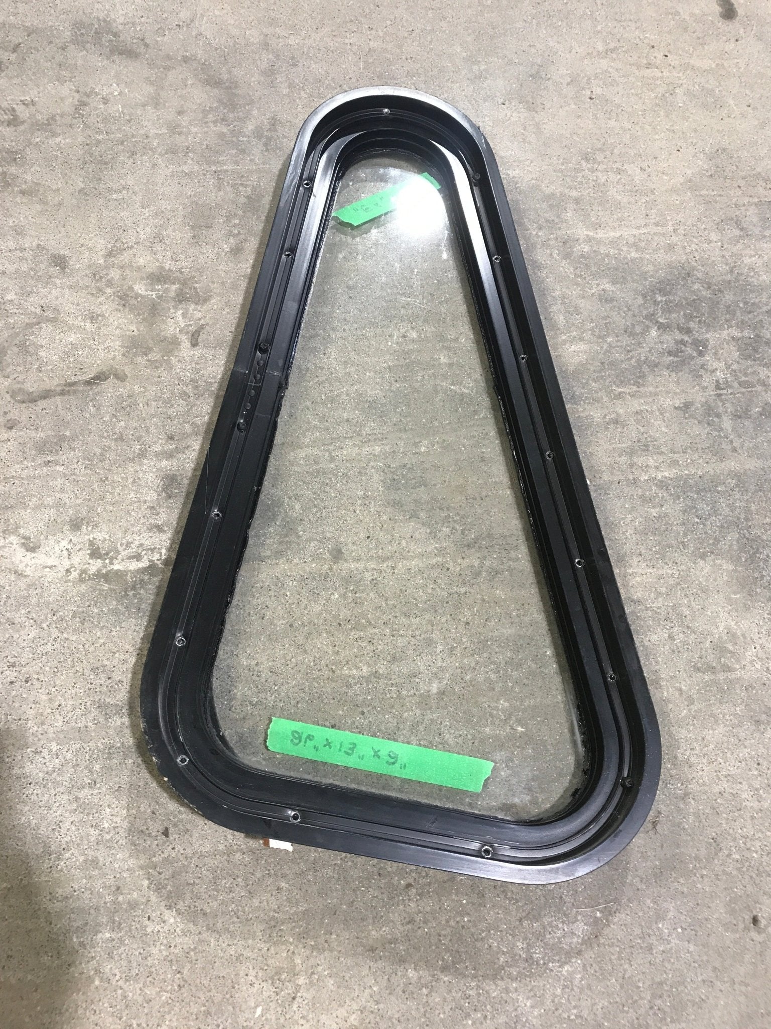 Used Black Radius Angled Non Opening Window : 26" W X 13" H X 2" D - Young Farts RV Parts