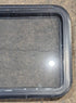 Used Black Radius Emergency Opening Window : 29 1/2" W x 21 1/2" H x 1 1/2" - Young Farts RV Parts